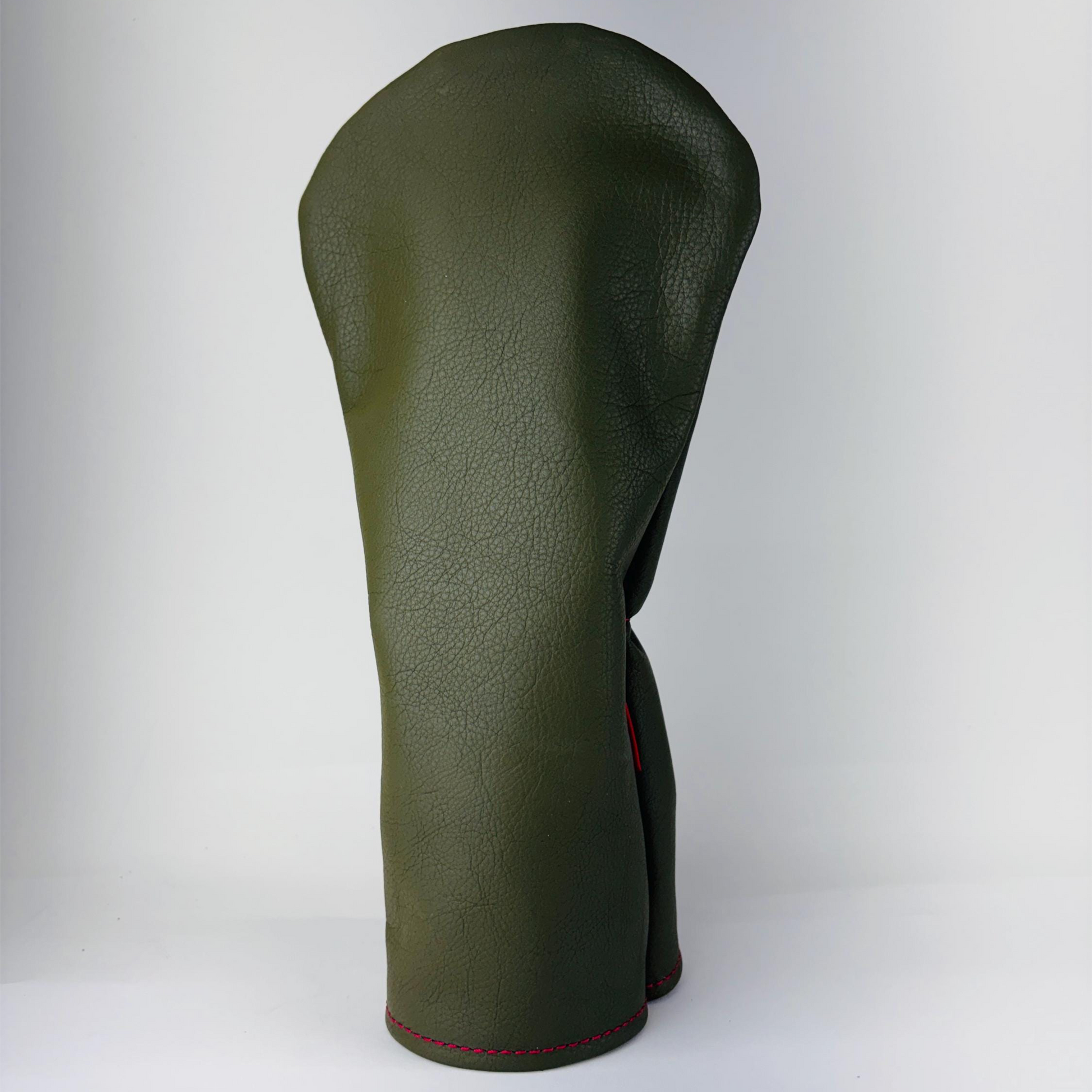 Olive green golf club head cover on a white background