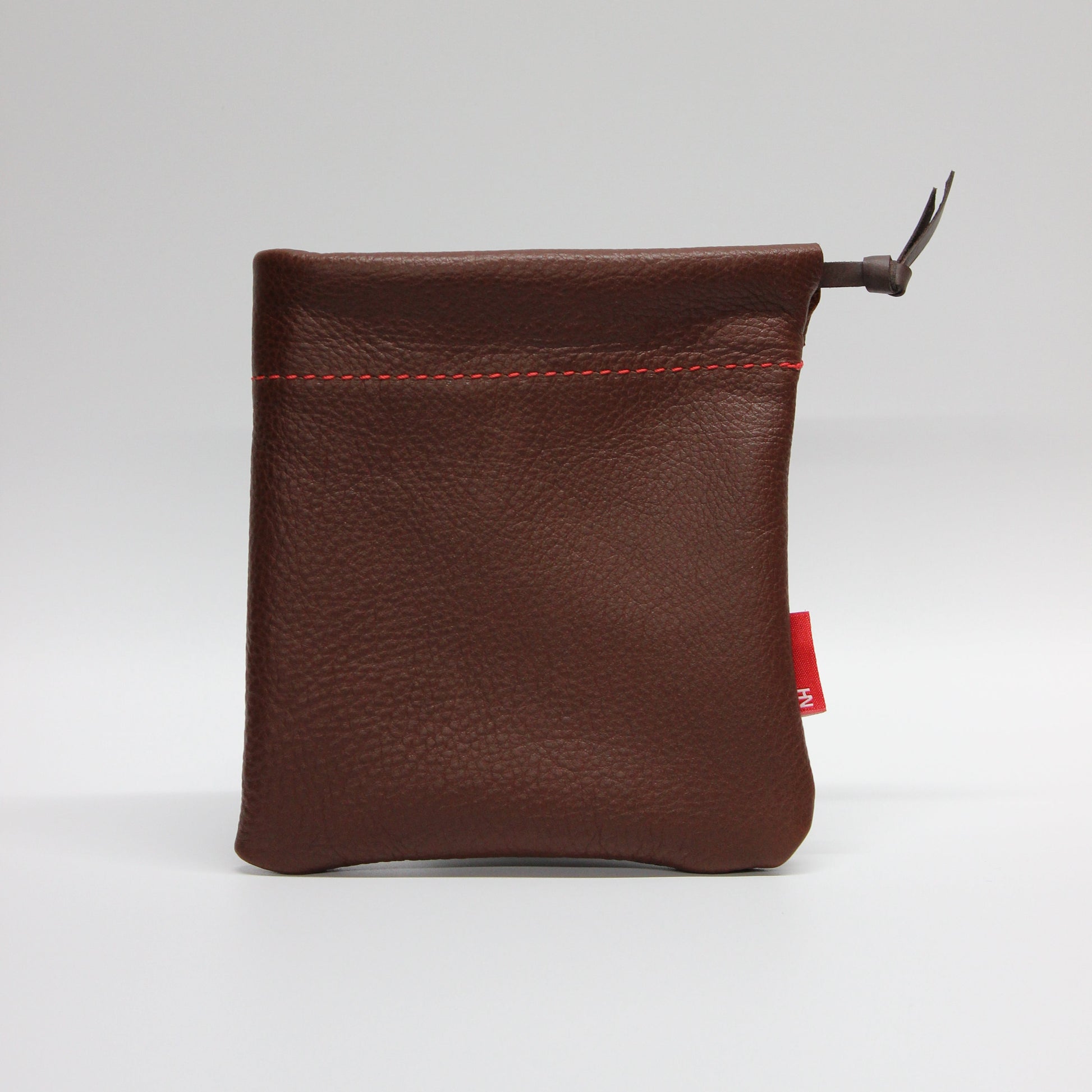 Brown leather wallet on a white background
